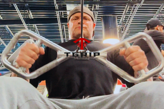 Tim, the creator and founder of Tgrip Bars performing a cable row with a original tgrip attachment